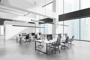 Modern open-plan office space with computers and chairs. 3D Rendering
