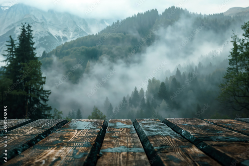 Aufkleber empty wooden tabletop overlooking misty mountain forest in the background