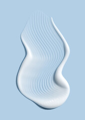 creamy smear of white cosmetic texture close up on blue background skin care concept