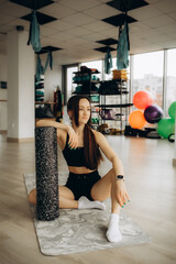 woman training, young woman warms up and stretching before or after a workout