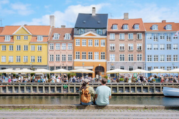 Couple Admiring Copenhagen's Colorful Waterfront