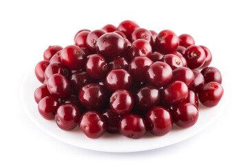 Ripe red cherries on plate isolated on white background