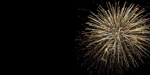 Fototapeta premium bright white and gold fireworks at new year with copy space comeliness 
