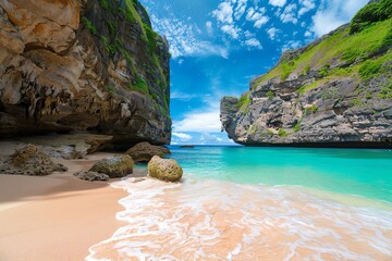 Fototapeta premium Stunning view of a tropical beach with crystal clear water and rocky cliffs.