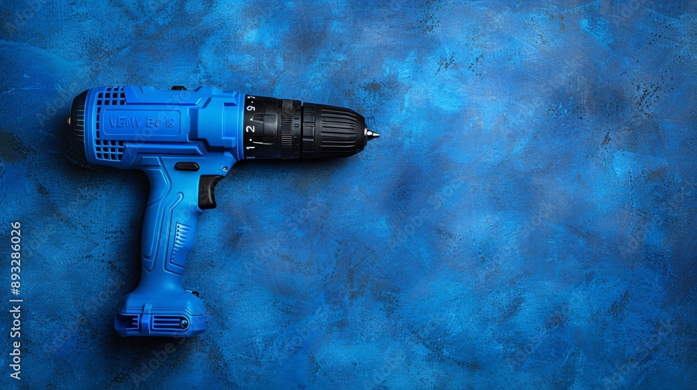 Poster Illustration of a handheld power drill with a compact design centered with empty space around the edges Stock Photo with copy space