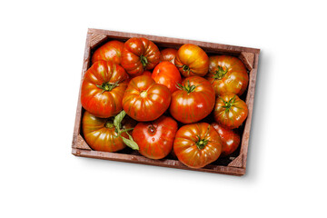 Assorted tomatoes in rustic crate