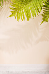 Template with empty table and wall with leaves shadow