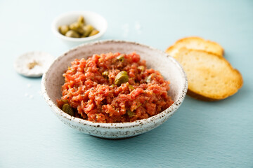 Traditional steak tartare with capers