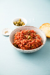 Traditional steak tartare with capers