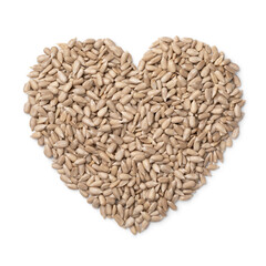 Shelled sunflower seeds in heart shape close up isolated on white background