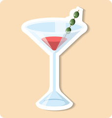 Elegant martini glass with olives standing on pink background