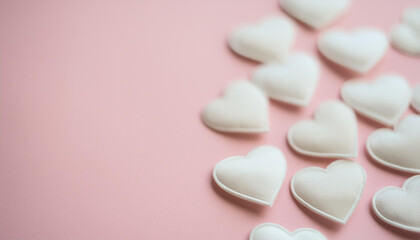 White hearts on isolated pink. Valentine's Day holiday. Love and romantic concept. Close-up.
