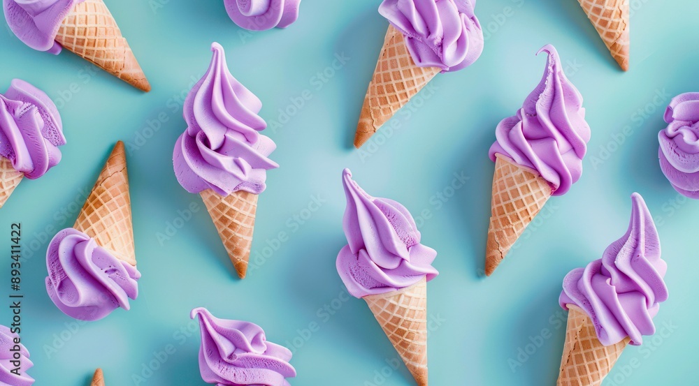 Canvas Prints Waffle cones with purple ice cream swirls on pastel blue background, top view, minimal flat lay style.