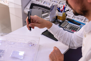 demonstrate the effectiveness of the transition within the lens between the clear state and the darkened sunshade state when exposed to light