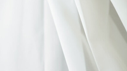 Obraz premium Elegant white tulle background for home textiles and wedding dress fabric