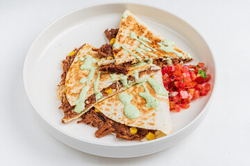 Mexican tacos with pulled pork, avocado, chili peppers