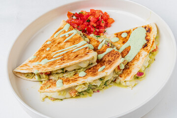 Mexican tacos with pulled pork, avocado, chili peppers