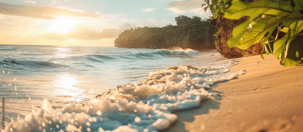 Aufkleber Beach scene with sandy shore and ocean waves in a tropical setting is captured in the copy space image