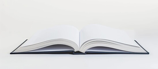 An empty open book with copy space image on a white backdrop