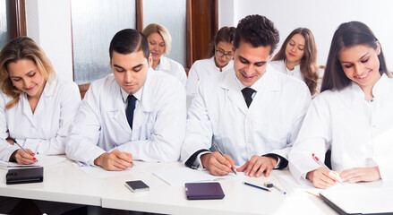Interns at lecture at university