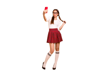 Full length body size view portrait of nice attractive lovely funky cheerful girl wearing uniform holding in hands cell making taking selfie plump lips isolated on bright vivid shine yellow background
