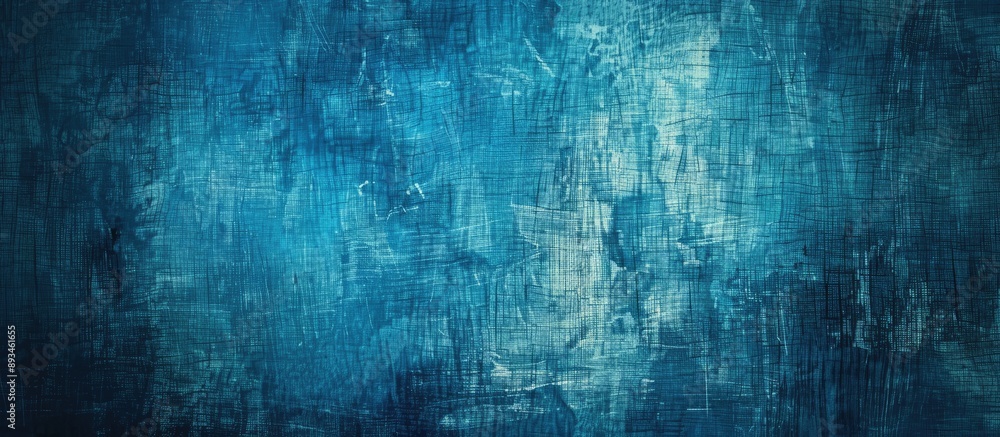 Fototapete background with a grungy blue canvas texture and copy space image.