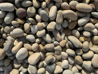 A pile of rocks with a variety of sizes and colors