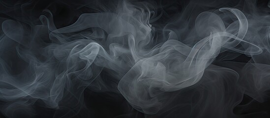 Fototapeta premium Smoke texture blending against a dark backdrop, creating a natural pattern with a mysterious and captivating foggy atmosphere, perfect for a copy space image.