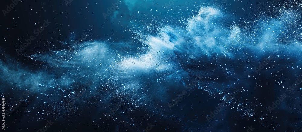 Poster freeze action of blue powder bursting on a dark background, forming an abstract white dust cloud exp