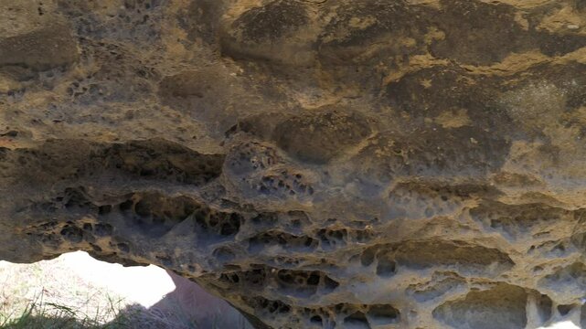 Close-up shot of Mushikui-iwa in Horon, Wakayama, Japan, sliding right. Captures the unique rock formations and scenic beauty. Ideal for nature films, travel documentaries, and promos.