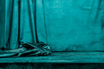 Green textile material background with copy space for montage products display.