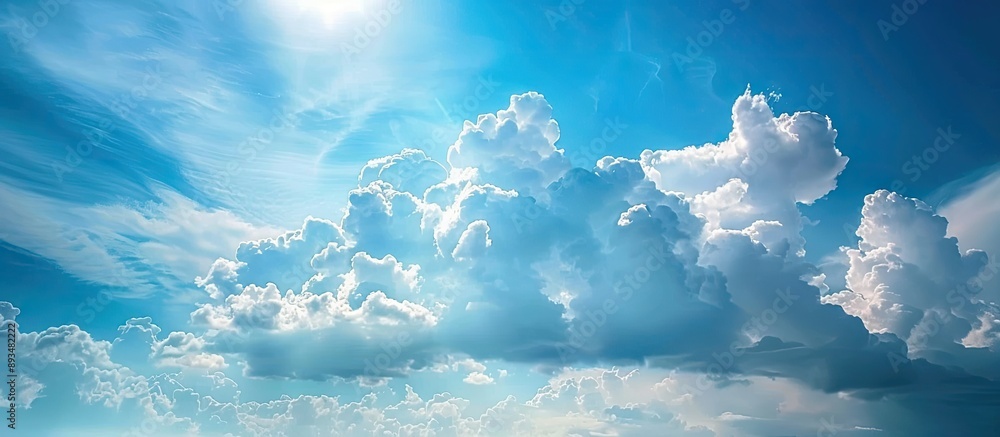 Poster a picturesque scene of the expansive blue sky with fluffy clouds suitable for a copy space image