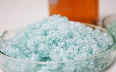 Close-up samples of processed glass waste for material development.