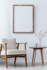 Minimalist chair and table with blank frame on wall