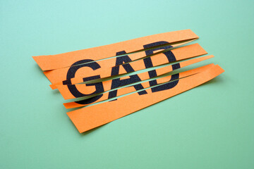 Cut sheet of paper with abbreviation GAD Generalized Anxiety Disorder. © Vitalii Vodolazskyi