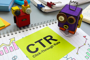 Little robots and a piece of paper with an inscription CTR Click-through rate.