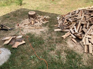 Chopping and sawing firewood from slats