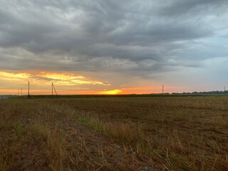 Panorama of sunrise at dawn in the field