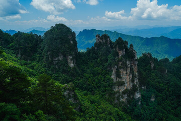Zhangjiajie national forest park, China, Glass bridge of Zhangjiajie China Tianzishan with blue sky, concept of world heritage, avatar, heritage peak or cliff mountain, tourist attraction famous place