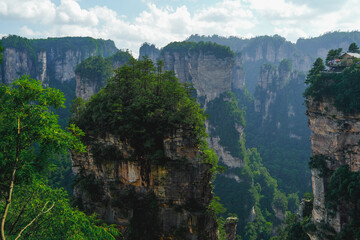Zhangjiajie national forest park, China, Glass bridge of Zhangjiajie China Tianzishan with blue sky, concept of world heritage, avatar, heritage peak or cliff mountain, tourist attraction famous place