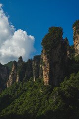Zhangjiajie national forest park, China, Glass bridge of Zhangjiajie China Tianzishan with blue sky, concept of world heritage, avatar, heritage peak or cliff mountain, tourist attraction famous place