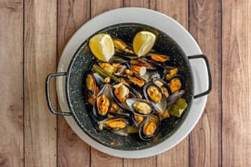 Mussels a la gallega are a typical dish of Galician cuisine, especially in the region of Galicia, Spain