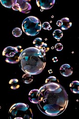 Bubbles floating in the air on a black background.