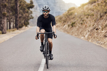 Naklejka premium Man, athlete and cyclist with helmet, mountain bike and safety gear for sport, exercise or endurance. Male person, fitness and route with cycling for training, physical activity or wellness in nature