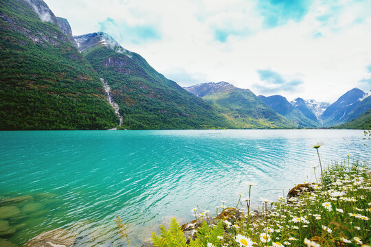 View of the glacier Oldevatnet Lake on a cloudy day. Beautiful wilderness of Norway
