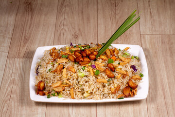 Close up of Burnt Garlic Vegetable Fried Rice in a white ceramic plate.