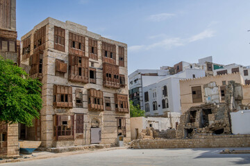 The plaza in the downtown of Jeddah, Saudi Arabia, with the old architecture, beautiful buildings and colorful windows.

