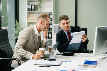 Portrait of success business people working together in modern office.