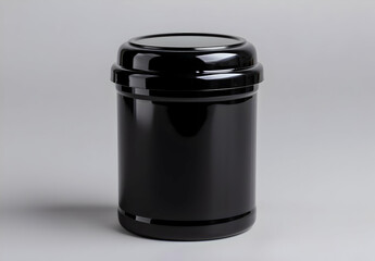 Sleek black plastic container, ideal for storage or organizing household items. Minimalist design on a neutral background.