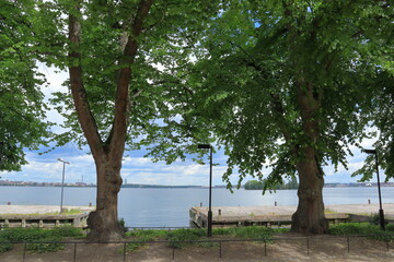 Sveaborg, Finland. Trees and harbor at Suomenlinna fortress. Baltic sea in background.